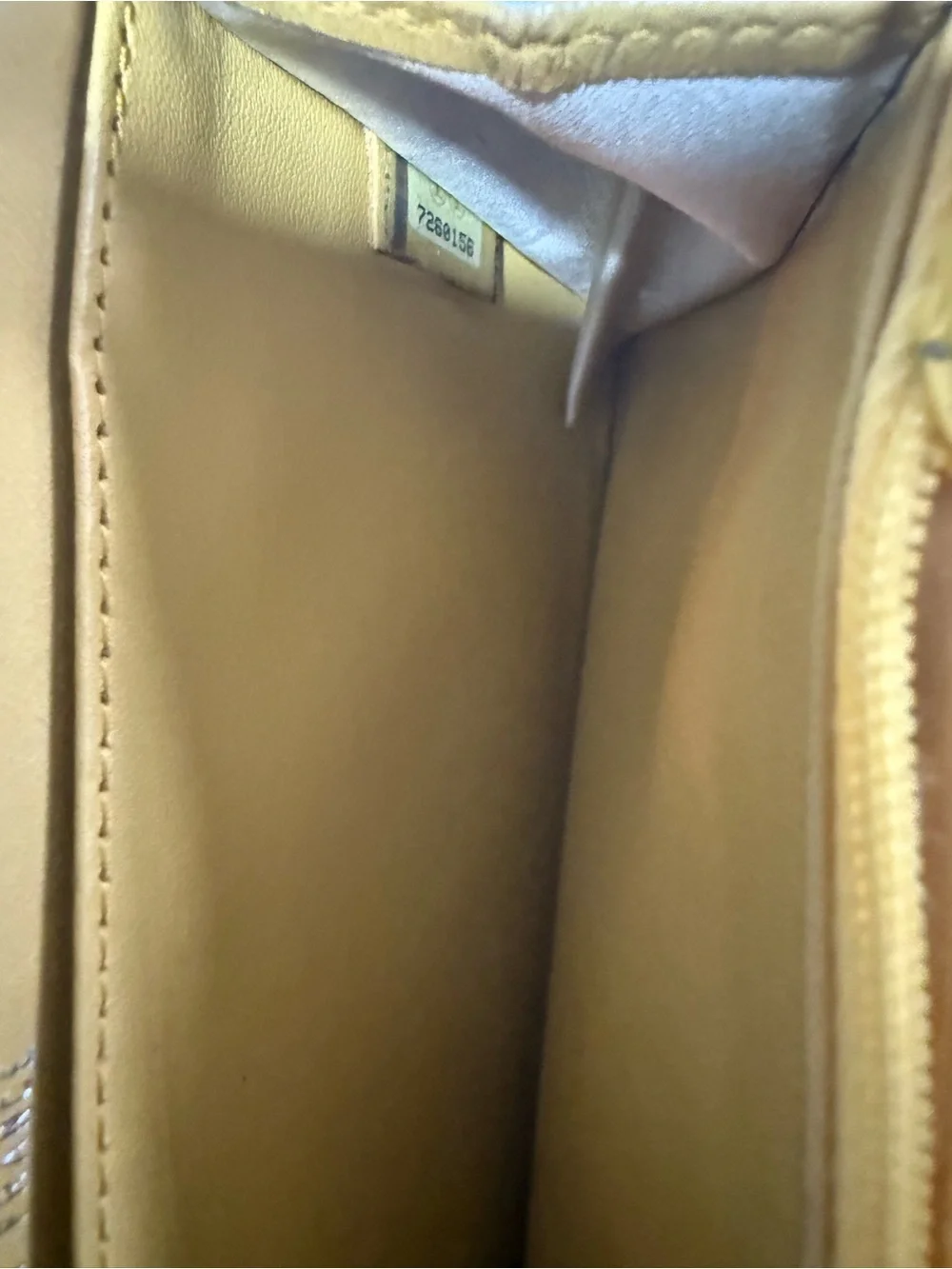 CHANEL Yellow Quilted Zip Around Wallet